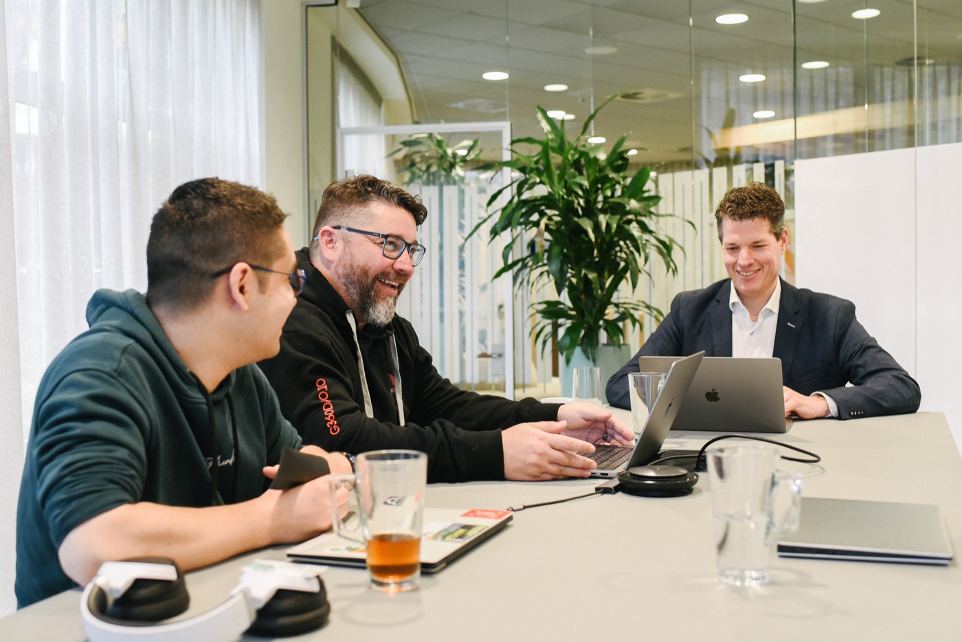A relaxed walkthrough conversation at the Guardian360 office
